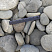 Kamenclub.ru: Галька речная плоская (серо-белая) фр. 70-120 мм. купить  в Новосибирске галька галечник речной серый, белый окатанная плоская  природная галька 9000 руб/т   фото КАМЕНЬ КЛУБ